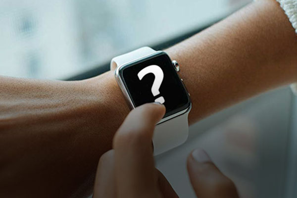 Person wearing an Apple Watch that has a question mark on its screen