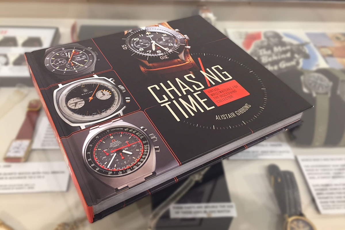 Chasing Time book resting on top of display of wristwatches