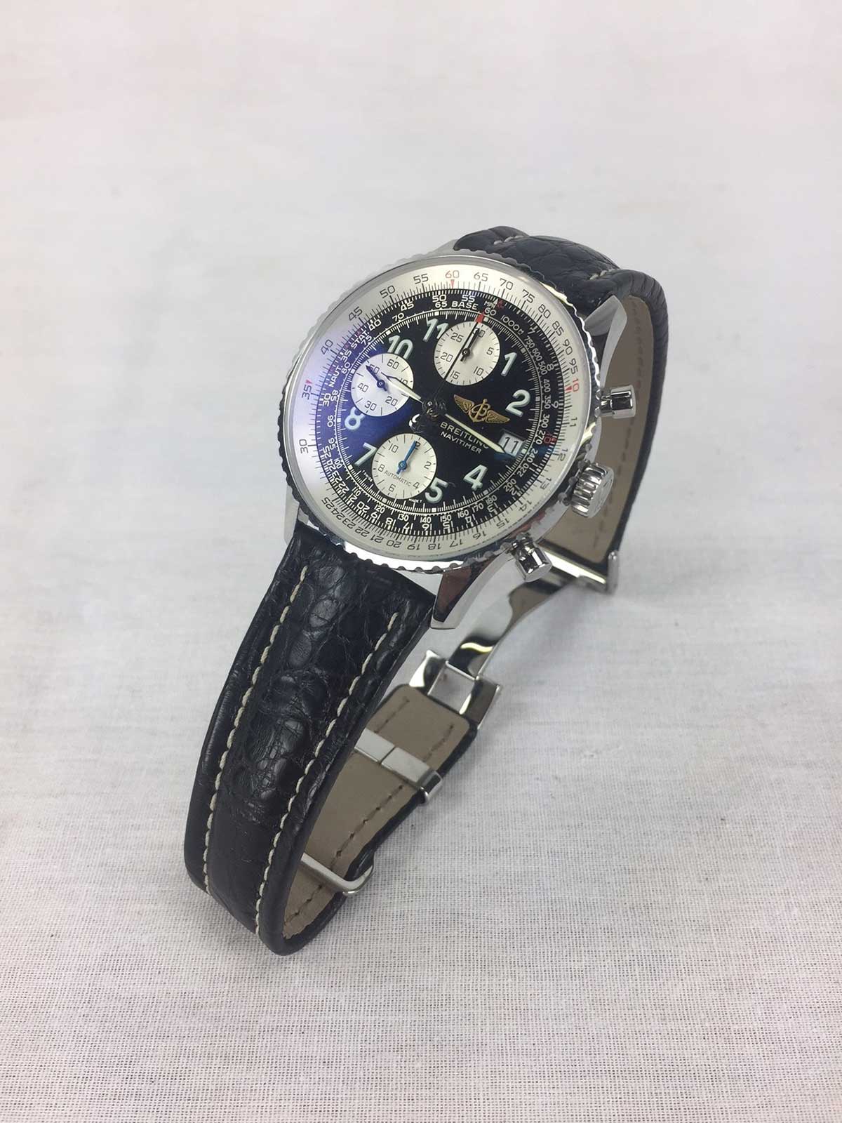 Navitimer II Breitling wristwatch with a black and silver dial and a black buffalo strap