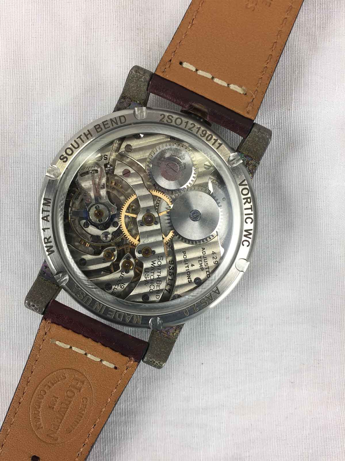 Exhibition case of the Vortic Watch Co., Harley Davidson wristwatch.