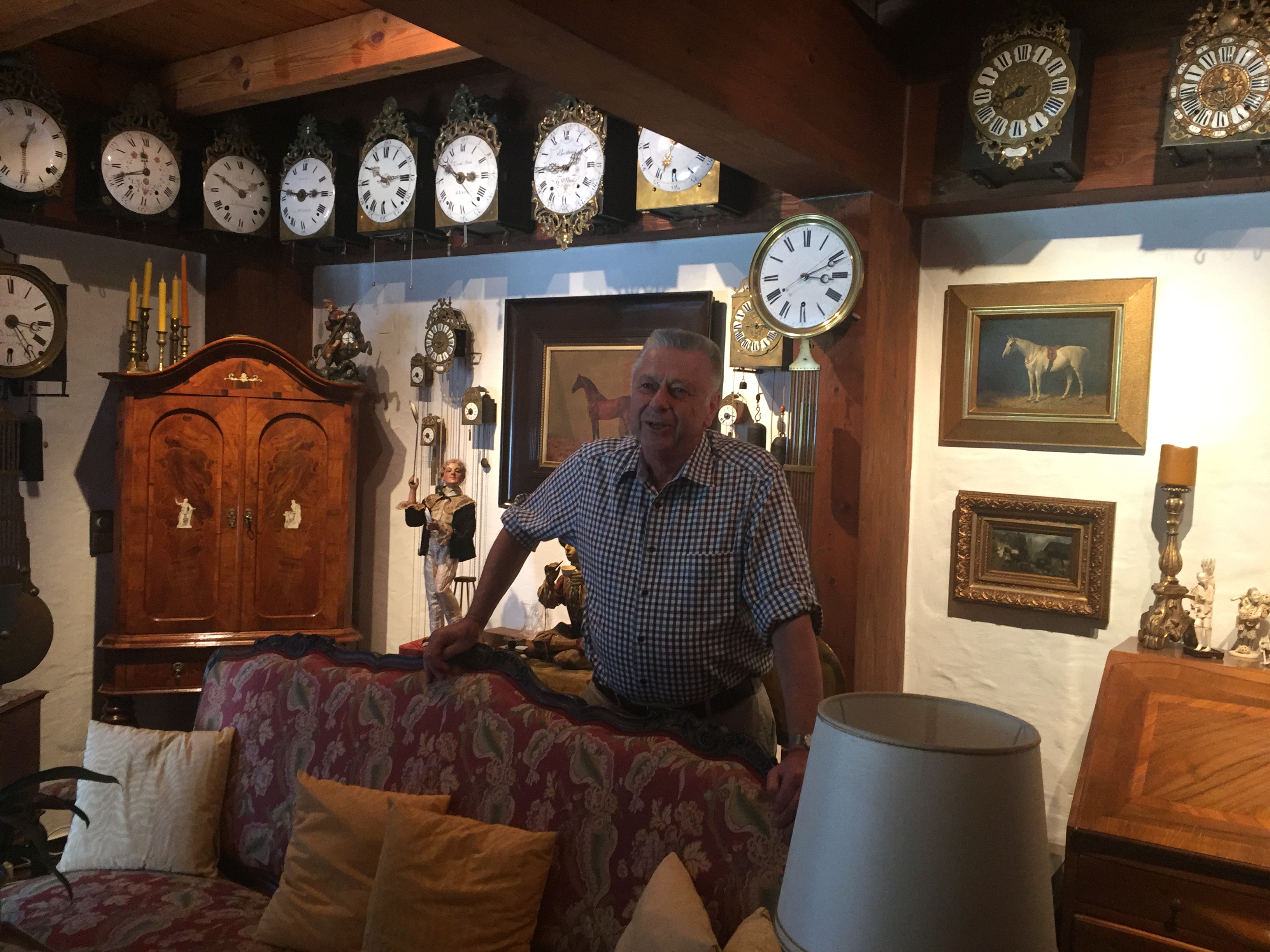 Siegfried Bergmann giving a clock tour in his home