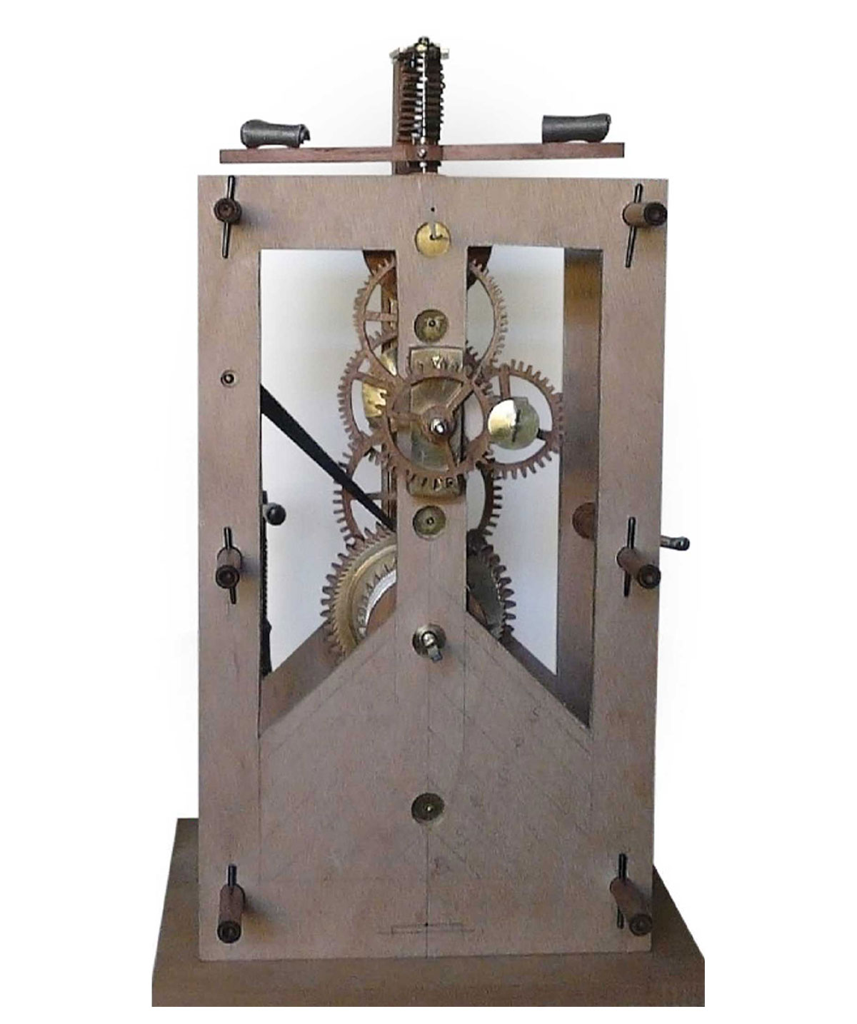 An unfinished case of a clock with gears exposed