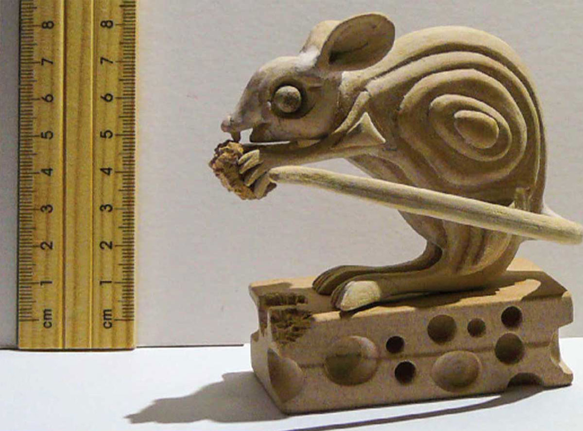 Fiberboard model of the unfinished mouse