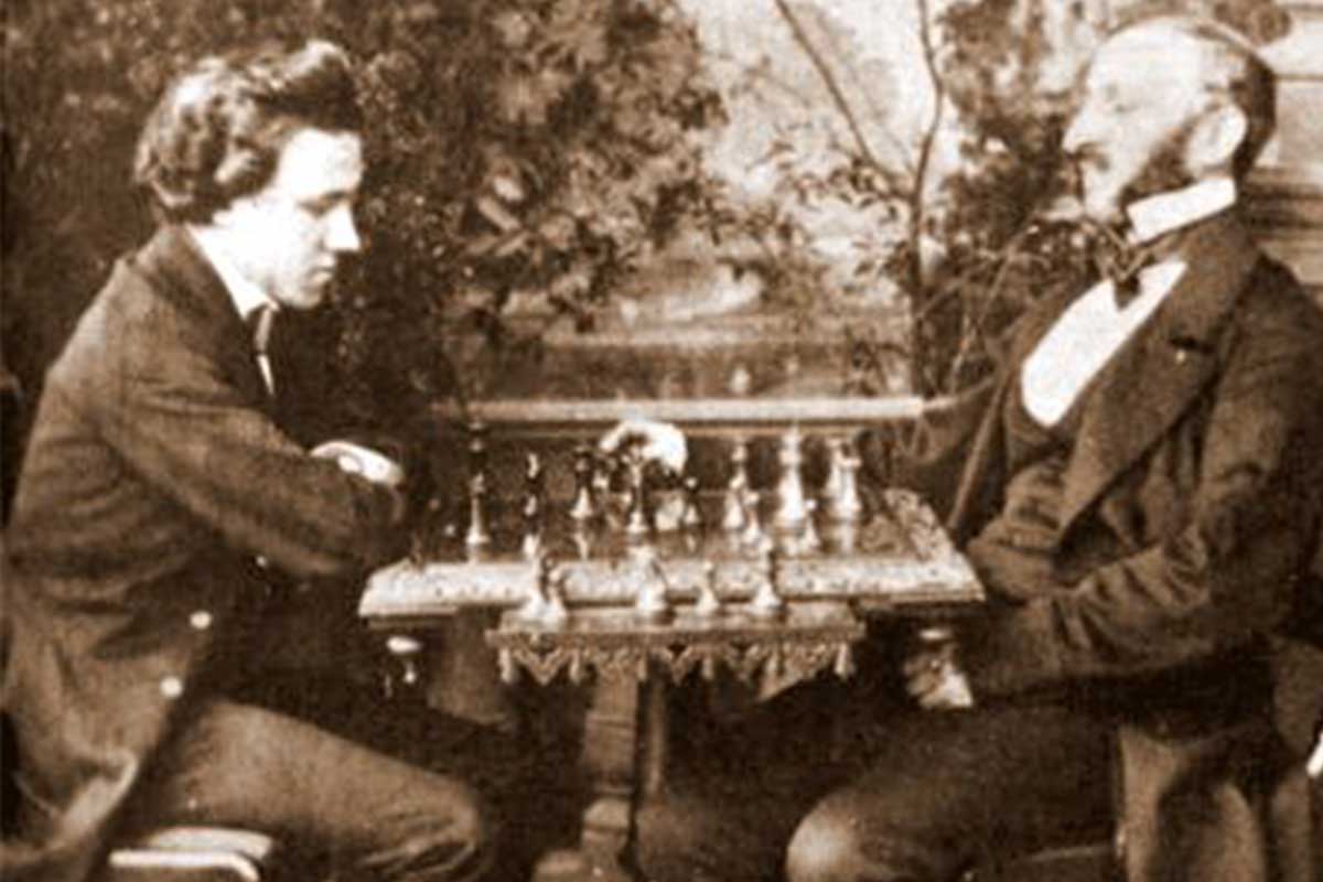 Paul Morphy sitting at a chess table across from Johann Löwenthal